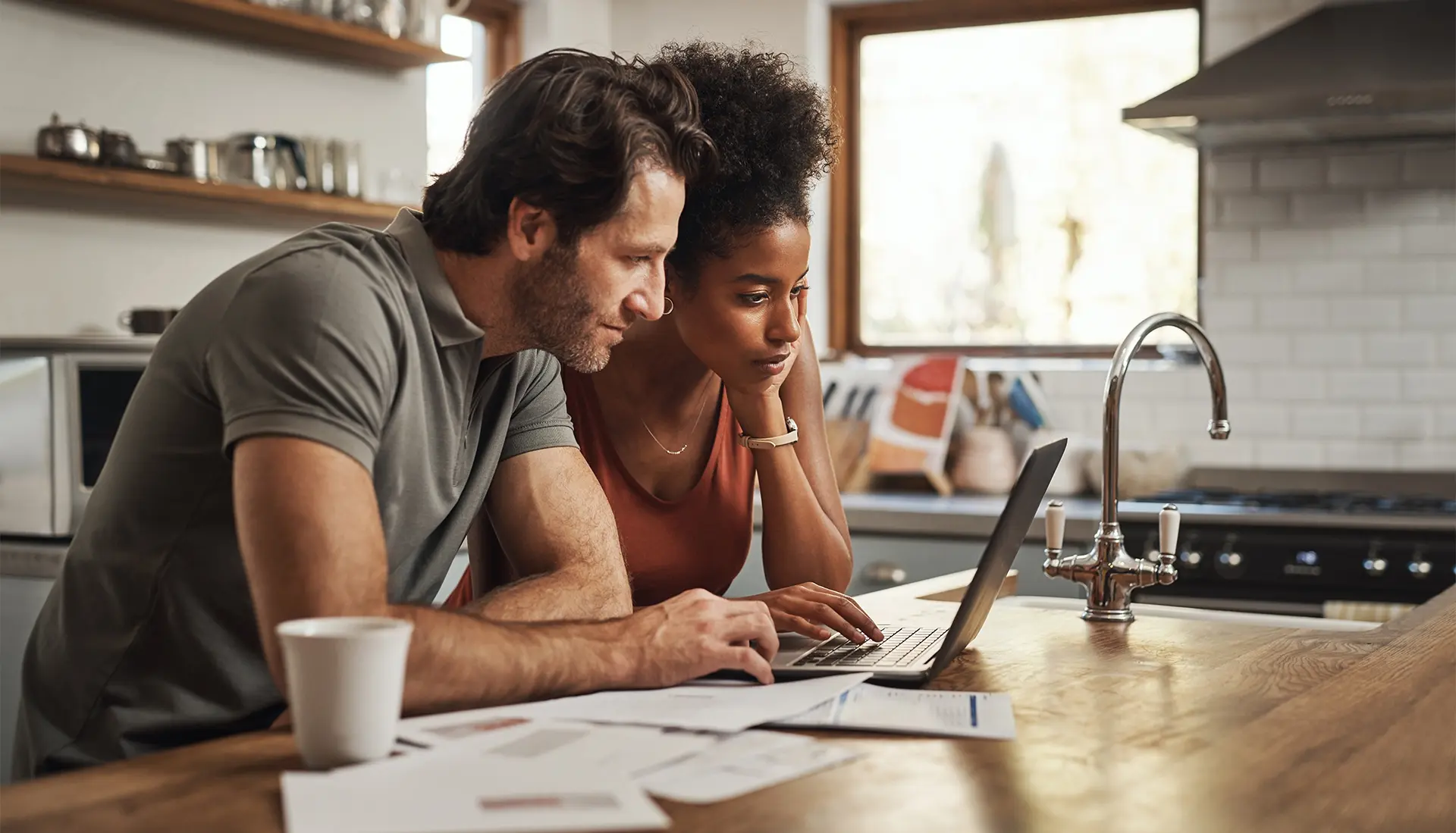 Resources & Tools Couple Doing Financial Calculations - Parvaneh Haghighy
